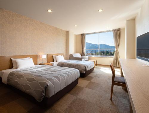 Postel nebo postele na pokoji v ubytování HESTA Hakone - GUEST HOUSE -