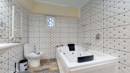Kúpeľňa v ubytovaní Jacuzzi Suites