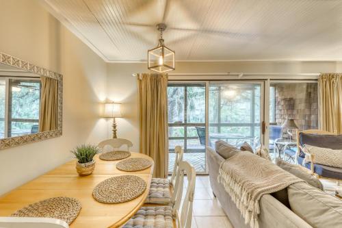 a living room with a table and a couch at Mariner's Watch 4250 in Kiawah Island