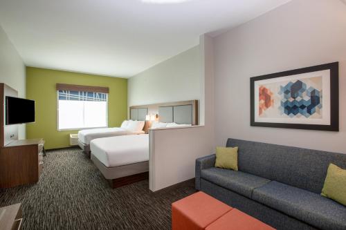 Ένα ή περισσότερα κρεβάτια σε δωμάτιο στο Holiday Inn Express Hotel & Suites Columbus by IHG