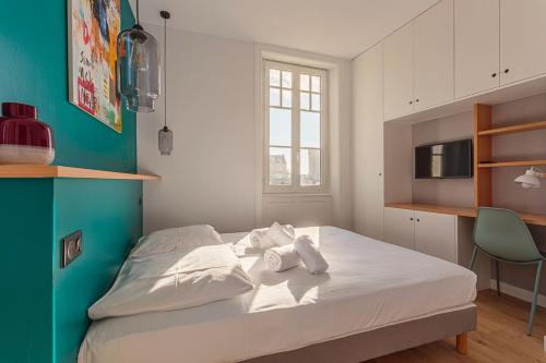 Katil atau katil-katil dalam bilik di ALTAYA Apt with balcony and sea view in Biarritz