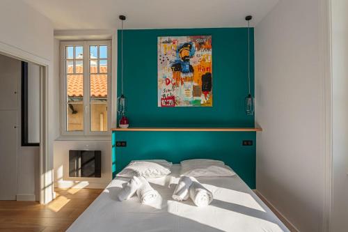 Katil atau katil-katil dalam bilik di ALTAYA Apt with balcony and sea view in Biarritz