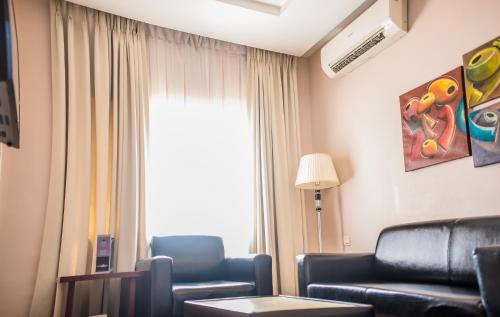 Χώρος καθιστικού στο Ace Premier Hotel