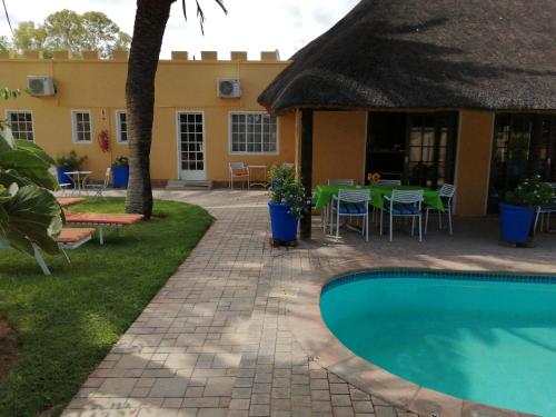 Bazén v ubytování Capbon Guesthouse nebo v jeho okolí