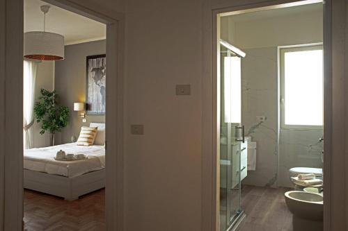 Ένα ή περισσότερα κρεβάτια σε δωμάτιο στο Residenza Flegrea