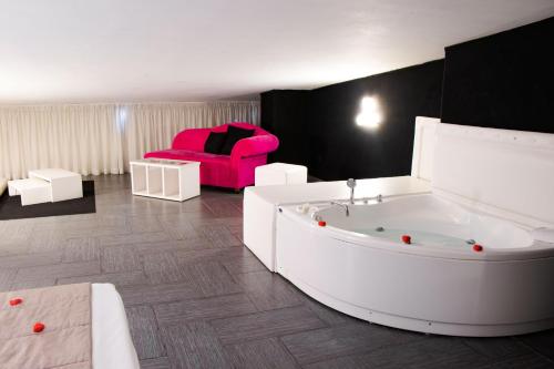 A seating area at Hotel Masaniello Luxury
