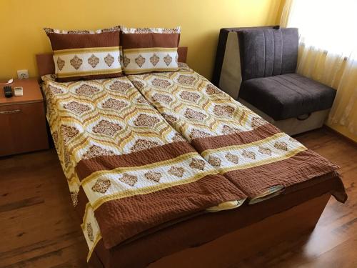 Postel nebo postele na pokoji v ubytování Guesthouse Elena