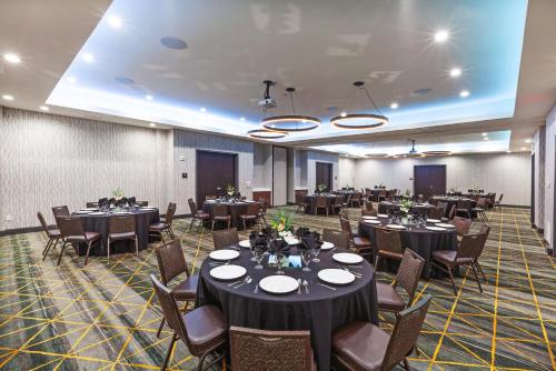 a large banquet hall with tables and chairs at Holiday Inn & Suites McKinney - N Allen by IHG in McKinney
