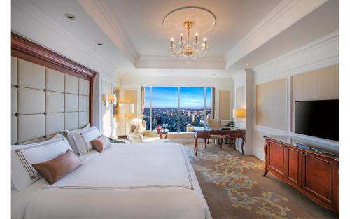 Postel nebo postele na pokoji v ubytování Kempinski Hotel Guiyang