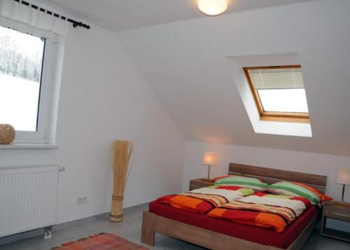 Postel nebo postele na pokoji v ubytování Ferienwohnung Charlott im Riesengebirge