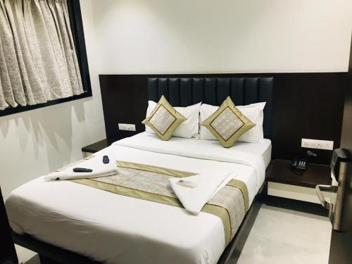 Cama o camas de una habitación en Hotel Flora Suites - Fort