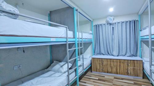 Llit o llits en una habitació de Hostel Nepal Pvt Ltd