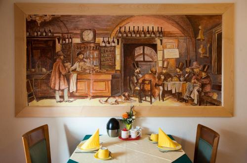 a picture of a kitchen with a painting on the wall at Villa Katharina in Rust