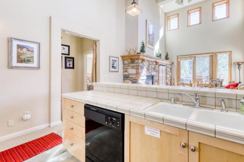 a kitchen with a sink and a stove at Mammoth Green Condos in Mammoth Lakes