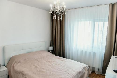Llit o llits en una habitació de Apartament de lux ultramodern in zona centrala