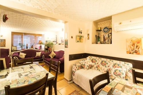 a living room with a couch and a table at Levanten Hostel in Istanbul