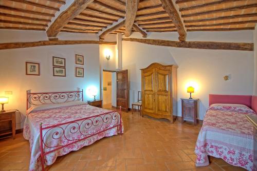 Кровать или кровати в номере San Donnino by PosarelliVillas
