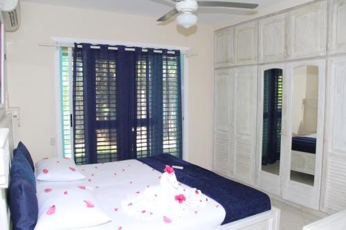 Кровать или кровати в номере Hotel Villas Las Palmas al Mar