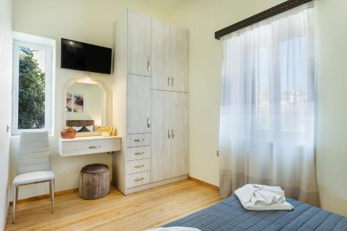 Кровать или кровати в номере Creta Galini House