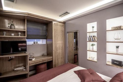 Posteľ alebo postele v izbe v ubytovaní Opus 5 Luxury Apartment in Liston Corfu