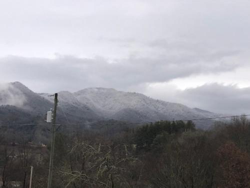 a view of a mountain with snow on it at Smokey Mountain Overlook in Bryson City