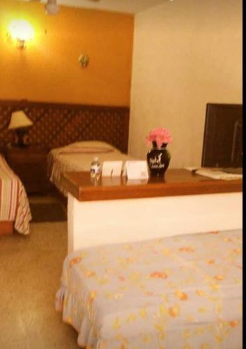 Katil atau katil-katil dalam bilik di Hotel Calendas