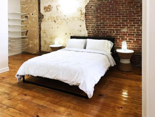 Voodi või voodid majutusasutuse Downtown Oasis - Location - Comfort - Style toas