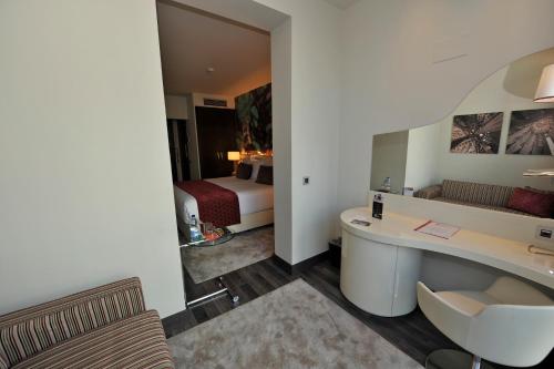 Posteľ alebo postele v izbe v ubytovaní Hotel Indigo Barcelona - Plaza Catalunya 4Sup by IHG