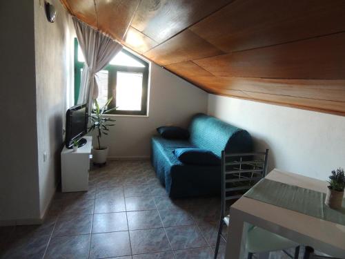 Μια τηλεόραση ή/και κέντρο ψυχαγωγίας στο Apartments Suljic - Cash Only Property