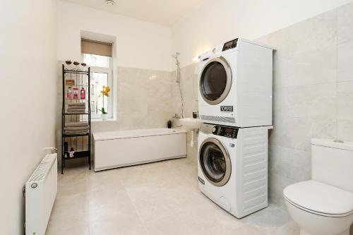 Ванна кімната в Arida Apartments
