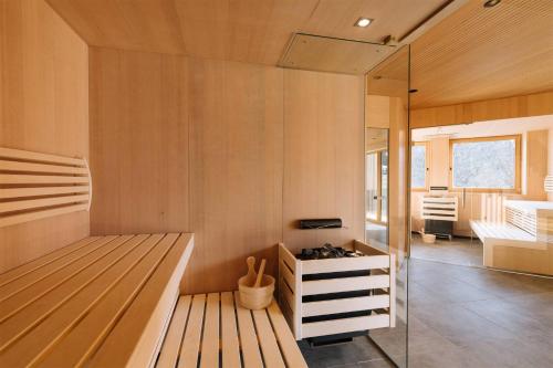 a room with a wooden bench in a room at Thalers Mariandl in Schladming