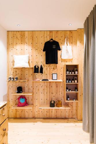 a room with a wooden wall with shelves at Thalers Mariandl in Schladming