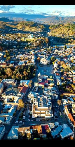 an aerial view of a city with a harbor at JERUSALEM luks מלון Kutaisi in Kutaisi