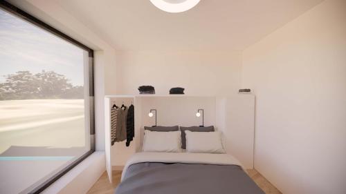 Una cama o camas en una habitación de The Blueview Appartements Novigrad