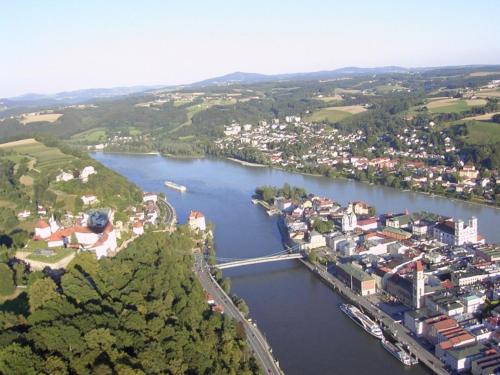 an aerial view of a river with a city at Ferienhof Neukirchinger in Tiefenbach