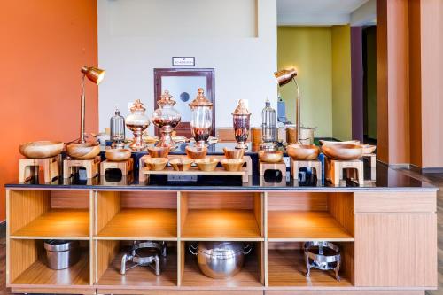 a counter with a bunch of items on it at Mount Himalayan Hotel in Gangtok