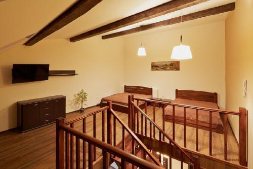 Μια τηλεόραση ή/και κέντρο ψυχαγωγίας στο Aparthotel Na Mytniy
