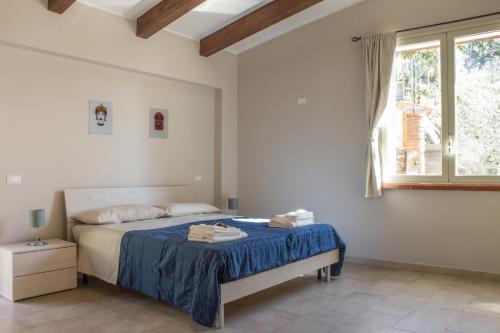 Posteľ alebo postele v izbe v ubytovaní Casa Ziretto