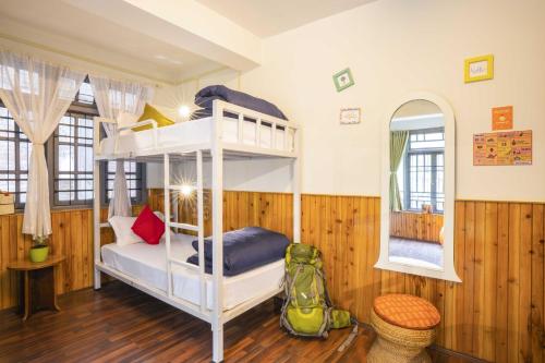 Letto o letti in una camera di Zostel Gangtok