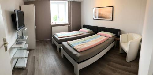 
Ein Bett oder Betten in einem Zimmer der Unterkunft Apartment Landshut
