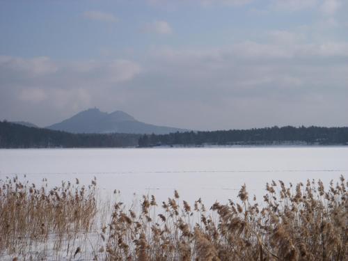 a view of a lake with mountains in the background at Rezidence Fami Deluxe Design in Staré Splavy