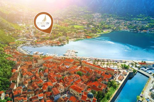 an aerial view of a city and a river at Hotel Porto In in Kotor