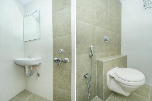 Koupelna v ubytování Hotel Saarang Forever