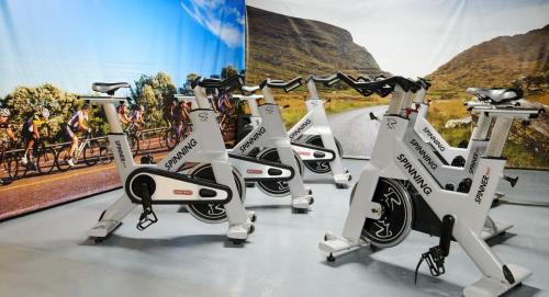 a row of exercise bikes on display in a museum at Killarney Towers Hotel & Leisure Centre in Killarney