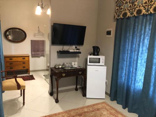 Η κουζίνα ή μικρή κουζίνα στο Loch Athlone Overnight Accommodation