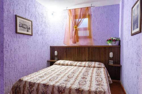 Katil atau katil-katil dalam bilik di Residence Casa Lama