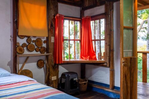 Una cama o camas en una habitación de Hostel Casa de Nelly