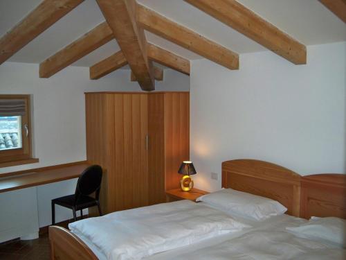 Cama o camas de una habitación en Relais Palazzo Lodron