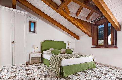 Ένα ή περισσότερα κρεβάτια σε δωμάτιο στο Villa Maria