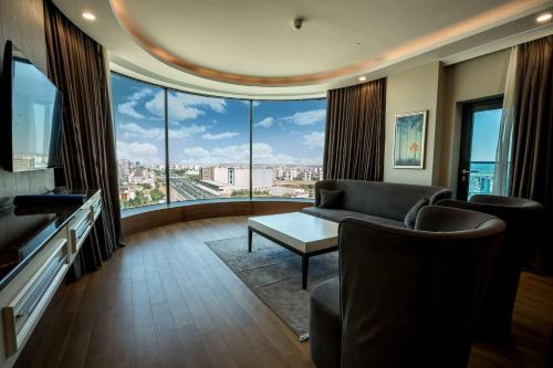 Televisyen dan/atau pusat hiburan di Radisson Blu Hotel, Diyarbakir